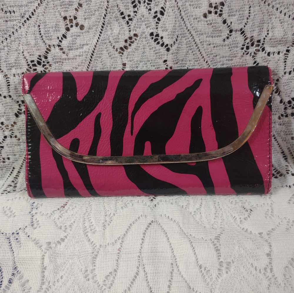 Pink and black trifold wallet